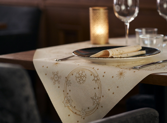 Festive cream table cover with a matching napkin in a restaurant