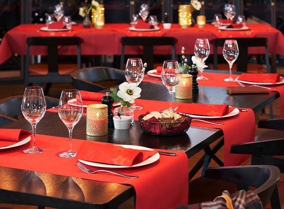 Restaurant fully decorated with red festive tableware